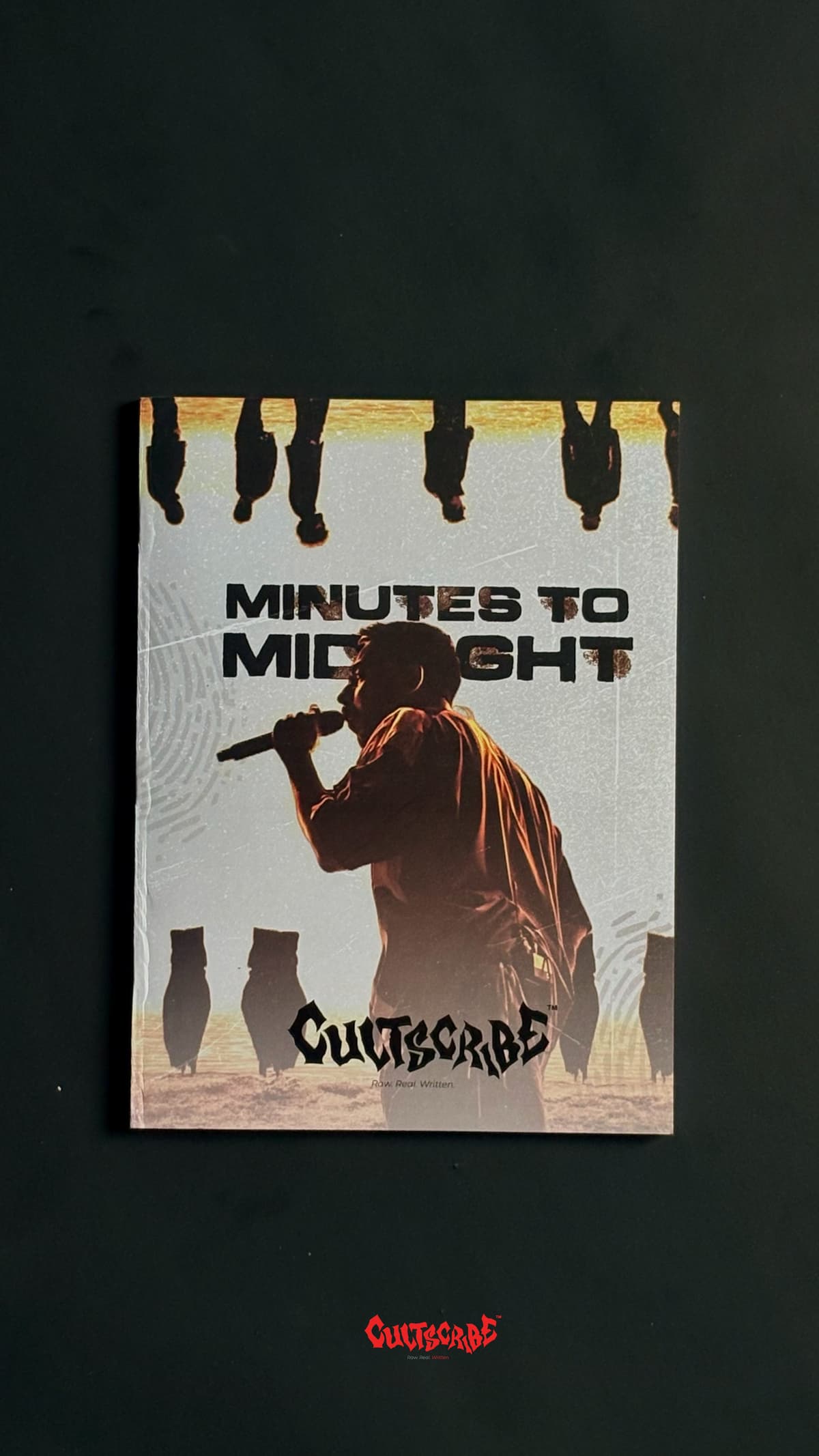 CultScribe Minutes to Midnight notebook cover — singer silhouette with horizon line artwork.